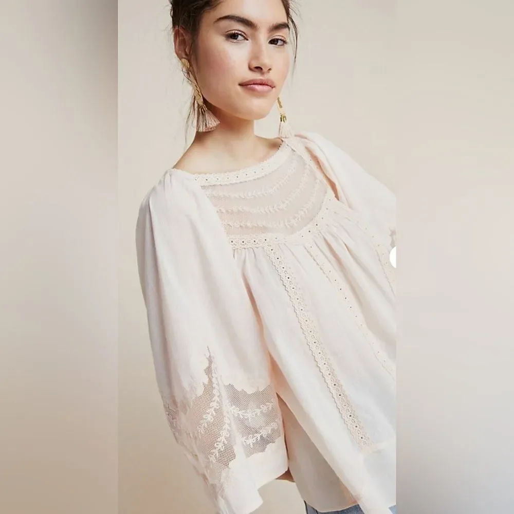 Anthropologie eyelet bell sleeve peasant top